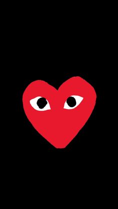 a red heart with two eyes in the middle and one eye on it's side