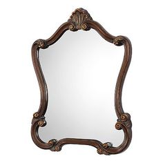 an ornate mirror is shown against a white background