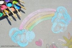 the sidewalk is painted with chalk and crayons