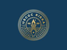 the usggc logo on a dark blue background with gold lettering and an intricate design