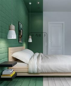 a bedroom with green walls and white bedding in the center, along with wooden flooring