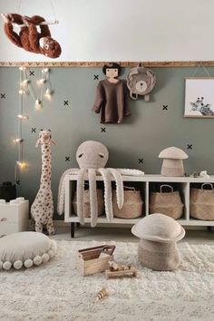 a baby's room with stuffed animals and toys