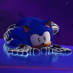 sonic the hedgehog is laying on his back