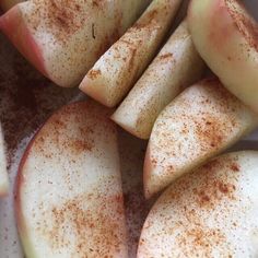 sliced apples with cinnamon sprinkled on them