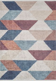 a multicolored rug with an abstract design