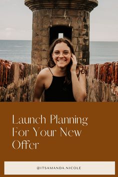 a woman standing in front of a tower with the words launch planning for your new offer