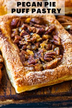 pecan pie puff pastry on a cutting board with the words pecan pie puff pastry