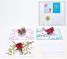 three cards with flowers and birds on them