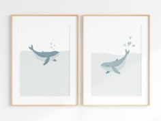 two framed pictures hanging on the wall next to each other, one with a whale in it's mouth