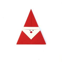 an origami santa claus hat on a white background