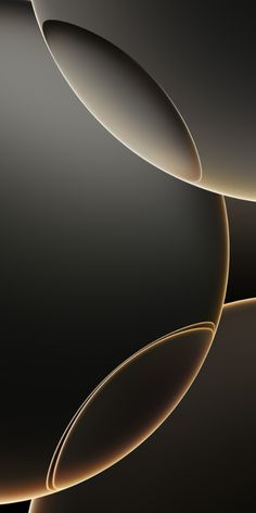 an abstract black and gold background with circles in the shape of rings on top of each other