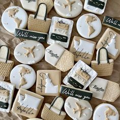 some cookies that have been decorated to look like they are being served at a wedding