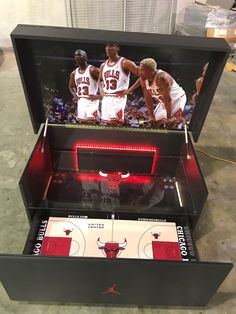 the chicago bulls basketball game is in its display case, and it's ready to be played