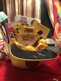 a bowl filled with snacks sitting on top of a table