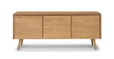 the sideboard is made from wood and has three doors, one with two drawers