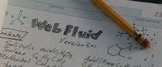 a notepad with writing on it and a pencil laying next to it that says web fluid