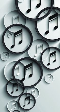 an image of music notes floating in the air with circles around them on a gray background