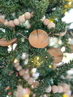 ornaments are hanging from the branches of a christmas tree