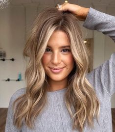 35 Golden Blonde Hair Ideas for a Radiant Look in 2024 7n Hair Color Blondes, Baylage Dark Blonde, Dark Blonde With Caramel Lowlights, Dark Blonde Light Blonde Balayage, Blended Lowlights In Blonde Hair, Blonde Hair For Mid 30s, Sultry Blonde Hair, Blondes Going Darker For Fall, Long Medium Blonde Hair