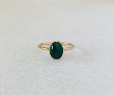 Malachite Natural Gemstone Gold Plated 925 Sterling Silver Band Ring Handmade item Gemstone: Malachite Gem color: Green Style: Minimalist Made to Order This natural green malachite ring will be made to order in your size. Every stone will have a unique pattern, may or may not have stripes, be darker or lighter green. DETAILS Malachite: 6x8mm (small) Band: 1.3mm Available in 925 sterling silver and gold plated. Styled with an emerald ring from my shop in the last photo. Malachite Jewelry Ring, Small Band, Green Stone Ring, Malachite Ring, Malachite Rings, Malachite Jewelry, Natural Gemstone Ring, Gold Gemstone Ring, Green Malachite