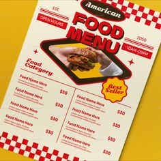 a menu for an american food restaurant on a yellow and red checkered tablecloth