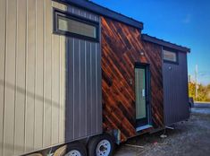 the tiny house is made out of wood and metal