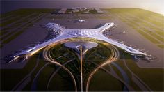 an aerial view of the airport at dusk