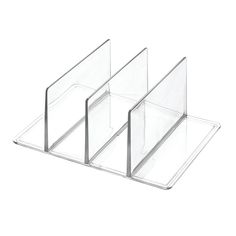 three clear acrylic trays sitting on top of each other