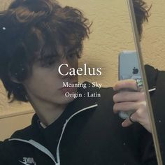 a young man taking a selfie in front of a mirror with the caption caelus meaning sky origin - latin