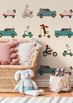 a child's room with toys and wall decals