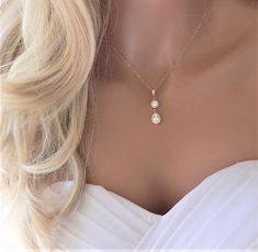 "Bridal Necklace Bridesmaid Jewelry Diamond CZ Silver or Rose Gold Bridesmaid Prom Special Event This very elegant Lariat Back Necklace is perfect for that special occasion. This features sparkly CZs in the front with a matching backdrop.   ✦ Please note: No returns on wedding jewelry IT'S IN THE DETAILS ✦ Rose Gold Filled or Sterling Silver Chain  ✦ Shown at 16\" ✦ CZ charms are plated over jewelers brass ✦ Matching Earrings have stainless steel post 🎁  BRIDESMAIDS GIFTS:  https://www.etsy.com/shop/GildedSapphireStudio?ref=seller-platform-mcnav§ion_id=25100884  WHY YOU'LL LOVE IT * Because handmade = made with love, care, and thought. * Ethically Sourced * Comes beautifully gift boxed * Crafted with care from sunny South Florida. ♡ HAPPINESS GUARANTEE: We stand by our jewelry and want yo Backdrop Necklace, Rose Gold Bridesmaid, Backdrops Necklace, Wedding Diamond, Gold Bridesmaids, Back Necklace, Back Jewelry, Wedding Jewellery, Wedding Jewellery Necklace