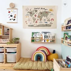 a child's room with bookshelves, toys and other items on the wall