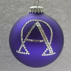 a blue ornament with the letter a on it