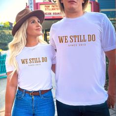 Celebrate your enduring love with a Personalized We Still Do Shirt, the perfect anniversary gift for couples featuring your custom wedding date. These matching anniversary shirts are a heartfelt way to commemorate your journey together as his and hers tees. Order yours today! 🌺PRODUCT DESCRIPTION -Front print says 'We Still Do' and next line 'Since' and you add the year you got married. -Each shirt is sold separately. Not sold as a set so you can choose your colors. -Personalize the year you we Anniversary Shirts Matching Couples, Anniversary Shirts, Anniversary Gift For Couples, Couples Custom, Cadeau Parents, Gifts For My Girlfriend, Anniversary Shirt, Les Couples, Anniversary Gifts For Couples