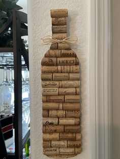 a cork wine bottle hanging on the wall