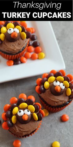 cupcakes decorated with chocolate frosting and candies in the shape of turkey faces