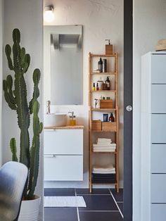 the bathroom is clean and ready to be used as a storage area for towels or other items