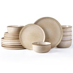 a stack of plates and bowls on a white background