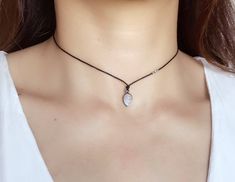 "Stylish and effortless 0.5mm black leather cord Necklace with moonstone or seaglass pendant . It is very comfortable and stand out! If this is too dainty for you please check out the thicker and bigger version: https://www.etsy.com/listing/536000591/dark-brown-leather-cord-lace-knocked?ref=shop_home_active_9 Or the match bracelet: https://www.etsy.com/listing/543430942/leather-cord-lace-knocked-with-hill?ref=shop_home_active_1 Each necklace is around 22\" and have double knot you can adjust the Moonstone Choker, Silver Necklace Outfit, Delicate Choker Necklace, Edgy Necklace, Boho Choker Necklace, Double Knot, Cord Lace, Cord Jewelry, Boho Choker