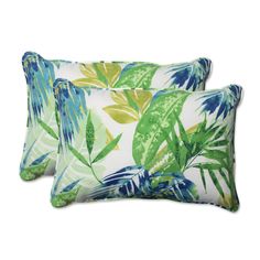 two green and blue pillows with tropical leaves on the front, one has a white background