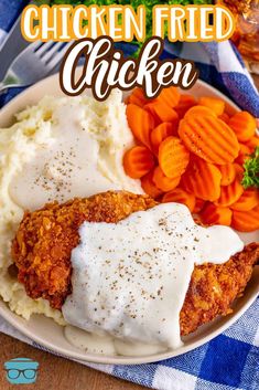 chicken fried with gravy, mashed potatoes and carrots on a plate