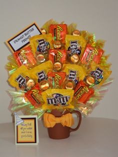 a coffee mug filled with candy and candies