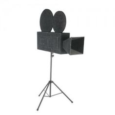 a black speaker on a tripod with two speakers attached to it's sides