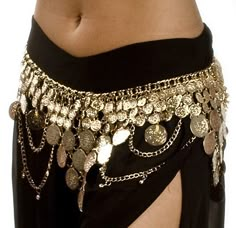 a woman's belly belt with gold coins and chains on the bottom, attached to her waist