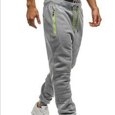 3repsmore Athleisure-Pantalon Street Wear Sweatpant Color: Light Gray Pant Style: Sweatpants Waist Type: Mid Material: Polyester (65%) Material: Cotton (35%) Fit Type: Regular Item Type: Full Length Style: Casual Thickness: Midweight Fabric Type: Broadcloth Length: Full Length Closure Type: Accent Drawstring Casual Jogging Pants With Pockets, Casual Winter Jogging Pants, Jogging Pants With Side Pockets, Jogging Trousers With Side Pockets, Casual Gray Sweatpants For Gym, Gray Jogging Trousers, Casual Gray Joggers For Jogging, Gray Trousers For Jogging, Gray Cotton Cargo Pants For Sports