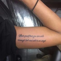 a woman's arm with a tattoo that reads, there is proof that you can speak through fear and will be an angry