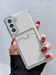 a woman's hand holding an iphone case with two buttons