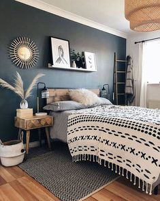 an instagram photo of a bedroom with blue walls