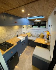 a kitchen and living area in an rv