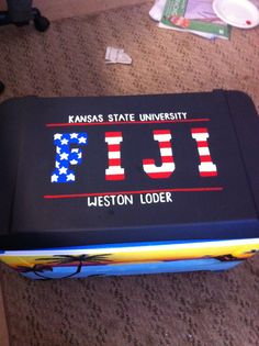 a book with the words kansas state university written on it and an american flag design